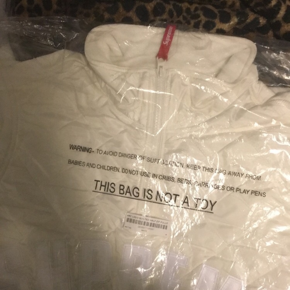 supreme quilted arc logo